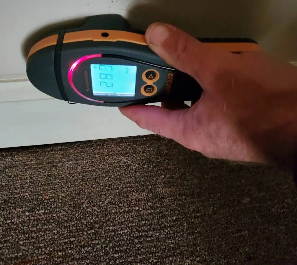 Moisture detection at baseboard during Storm Damage Restoration in American Fork